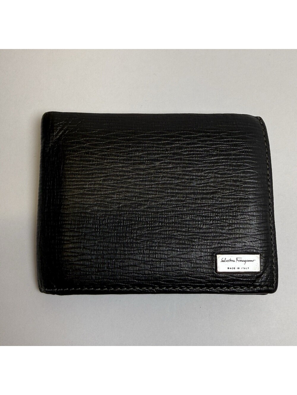 SALVATORE FERRAGAMO Men's Black Stamped Leather Calf Bifold Logo Wallet Card ID